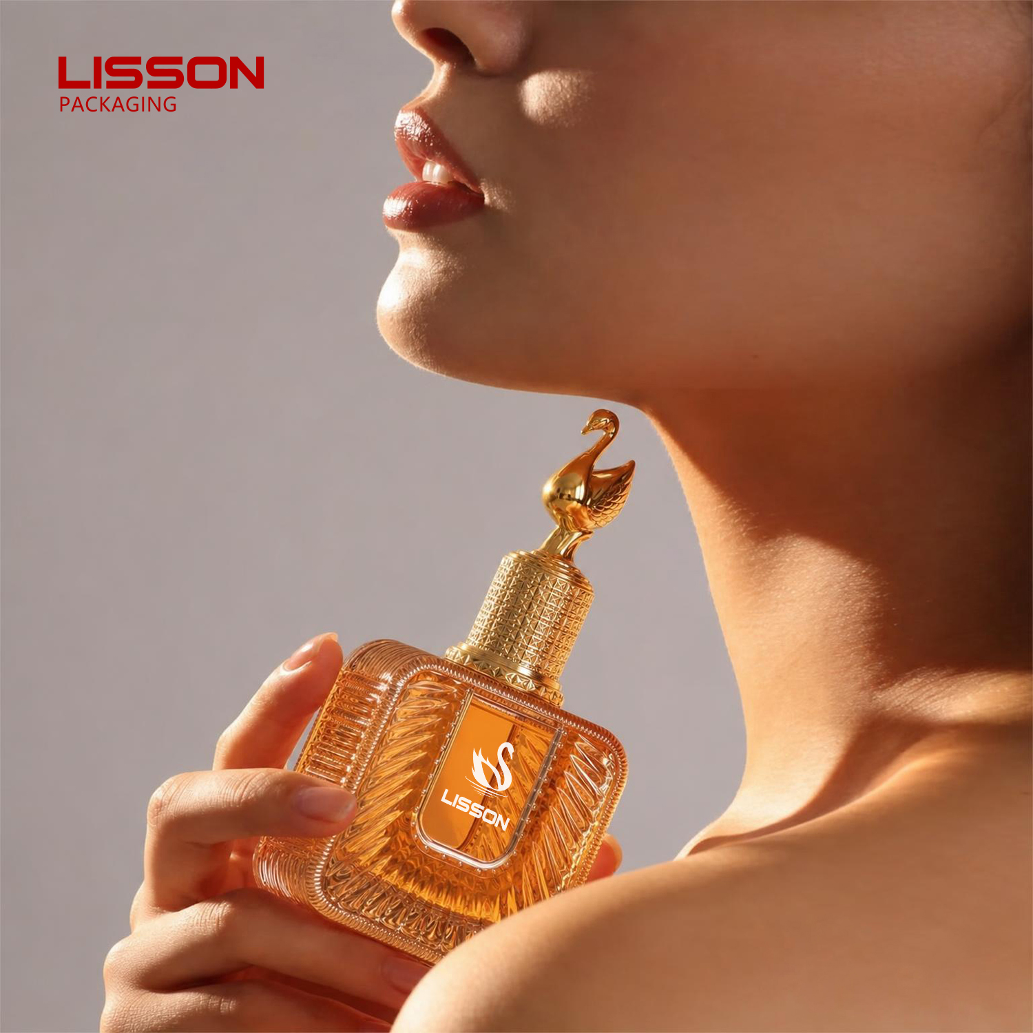 Swan-Adorned Perfume Bottle