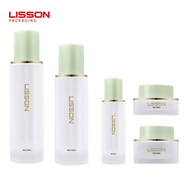 LS026 Skincare Packaging Suite with White Glass Bottles Cream Jars and Green Caps