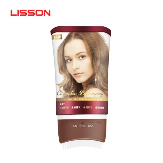 Tube innovant de soins capillaires avec peigne et applicateur de massage marche/arrêt