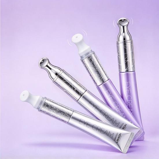 Tube de crème pour les yeux avec applicateur vibrant en céramique et métal